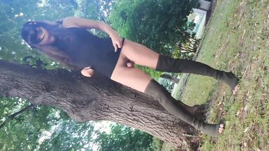 Sissy waking outside in sexy black dress and high heels