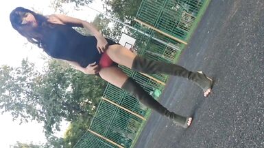 Sissy waking outside in sexy black dress and high heels - 2 image