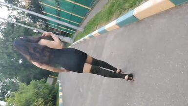 Sissy waking outside in sexy black dress and high heels - 3 image