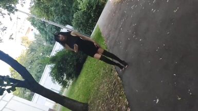 Sissy waking outside in sexy black dress and high heels - 5 image