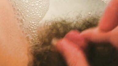 playing with my little dick in the bathtub hairy trans masc - 4 image