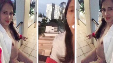 gorgeous shemale shows naked in balcony while smoking - 2 image