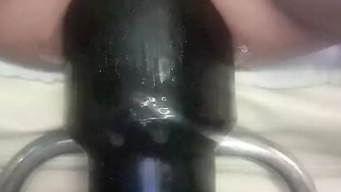 Christina takeing a huge big Black plug 10cm in diameter