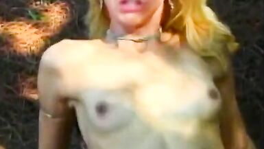 Blond she-male riding cock outdoors - 14 image