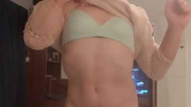 Tranny taking off her panties. - 1 image