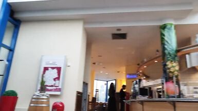 In the public toilet at a motorway service station