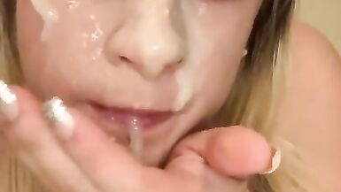 Transgender girl deepthroats huge double sided dildo and sprays fake cum on her face in the shower.