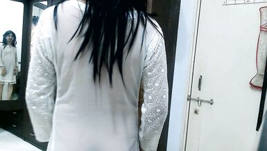 Beautiful inexperienced crossdresser femboy in a white sheer traditional wear. - 2 image