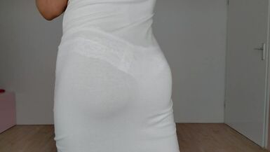 Sissy in see through dress trying on some Panties - 1 image
