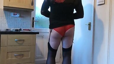 kelly cd cuming in a black and red dress stockings heels