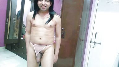 Inexperienced sissy crossdresser in light pink lingerie with thong playing with her big dick & showing anus. - 11 image