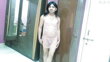 Inexperienced sissy crossdresser in light pink lingerie with thong playing with her big dick & showing anus.