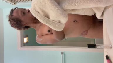 Me rubbing in the shower touching my Dick touching my ass this the first shower video I ever made - 1 image