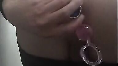 Sexy Crossdresser plays with anal balls under her clothes - 13 image