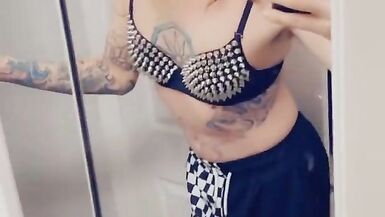 Trans Rocker Teasing Her Boobs - 10 image