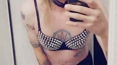 Trans Rocker Teasing Her Boobs - 12 image