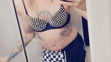 Trans Rocker Teasing Her Boobs - 15 image