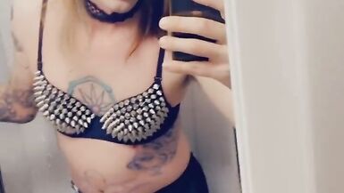 Trans Rocker Showing Off Her Boobs - 10 image