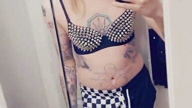 Trans Rocker Showing Off Her Boobs