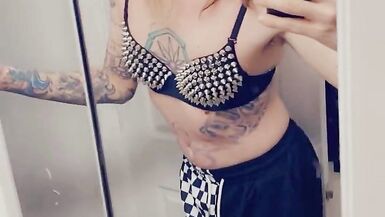 Trans Rocker Showing Off Her Boobs - 9 image