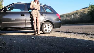 Risky striptease outdoors - 1 image