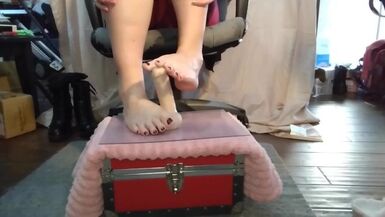 Watch this sissy teasing her dildo with her feet till she can't take it and has to sit on it! - 1 image