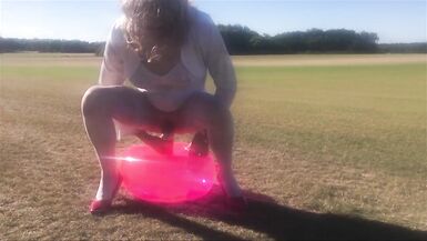 CD Slut Riding Dildo Seat Outdoors In A Field - 10 image