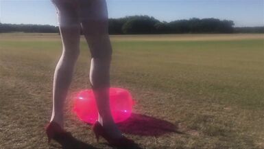 CD Slut Riding Dildo Seat Outdoors In A Field - 5 image