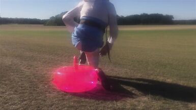 CD Slut Riding Dildo Seat Outdoors In A Field - 9 image