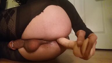 Sissy Crossdresser toys self and cums - 1 image