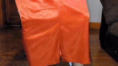 Long lined orange satin skirt with a white silky half slip. - 11 image