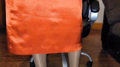 Long lined orange satin skirt with a white silky half slip. - 9 image
