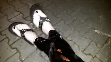 crossdresser on a public street in latex leggings and sexy platform flip flops - 14 image