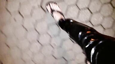crossdresser on a public street in latex leggings and sexy platform flip flops - 7 image