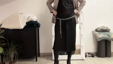 Black satin fetish long dress and silk jacket and high heels overknee boots and my cock hard and horny. Suck me gently - 1 image