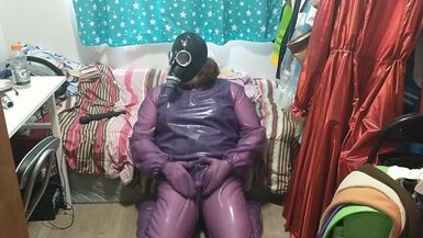 Latex Jelly Loose Purple Body Suit over Swimsuit Vibraitor and gasmask breathplay - 1 image