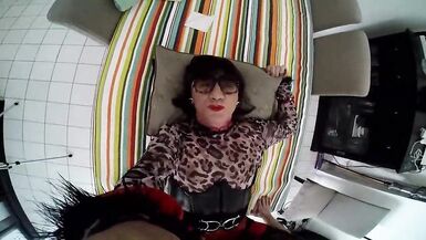 Mature latex shemale take a cock on the table - 11 image