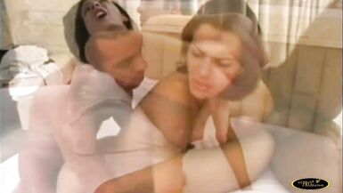 Brunette shemale in fishnet dress sucks and fucks and gets cum all over her