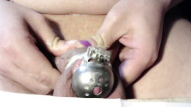 rubbing lotion on chastity cage and groin and skin. turn me on baby sissy talking about transition - 10 image