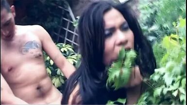 Tranny gets bent over while getting fucked in the ass outdoors - 1 image