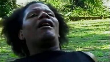 Black shemale Vinicius with big jugs is fond of riding hard pole of her boyfriend on the small glade - 13 image