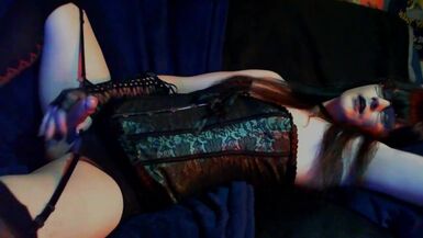 Mimsy taking a self facial in a cute corset - 1 image