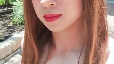 Sissy slut Bess walks outside her condo bottomless to play with herself