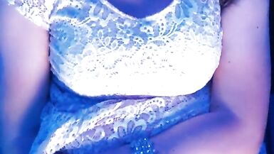 Sissy with big tits jerking off for the camera