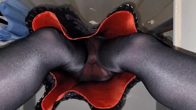 Black skirt with a red lining and pantyhose - 1 image