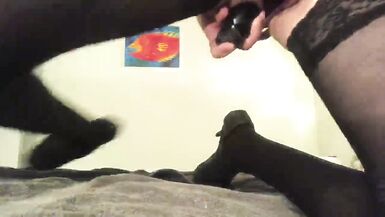 Blonde in purple string sitting on black toy - 14 image