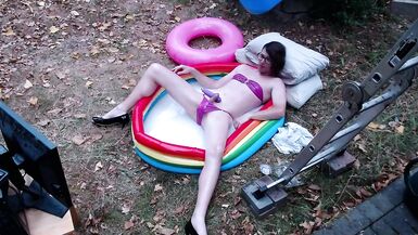 Outdoor WAM sissy gurl in pink pvc micro bikini oiled up and drenched in milky water plays with herself no cum