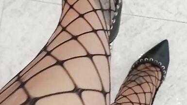 Mistress in heels play with her slave - 2 image