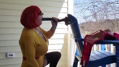 DeeDeeSlut69 in a Yellow Dress on her balcony Playing - 2 image