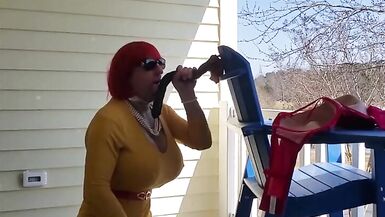 DeeDeeSlut69 in a Yellow Dress on her balcony Playing - 3 image